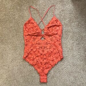 Orange floral see through body suit